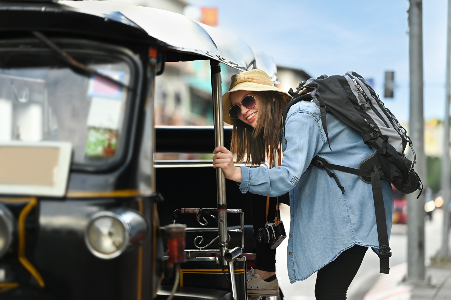 Budget traveller exploring Southeast Asia street food markets and local transport