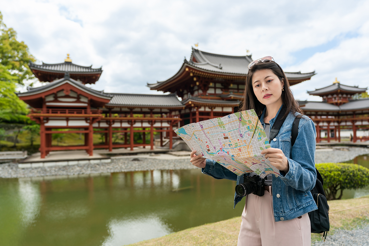 Traveller planning a Japan itinerary with routes and temples