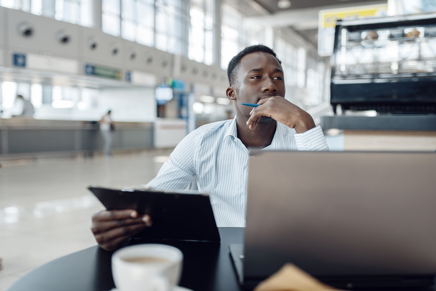 Traveller reviewing travel insurance options before departure